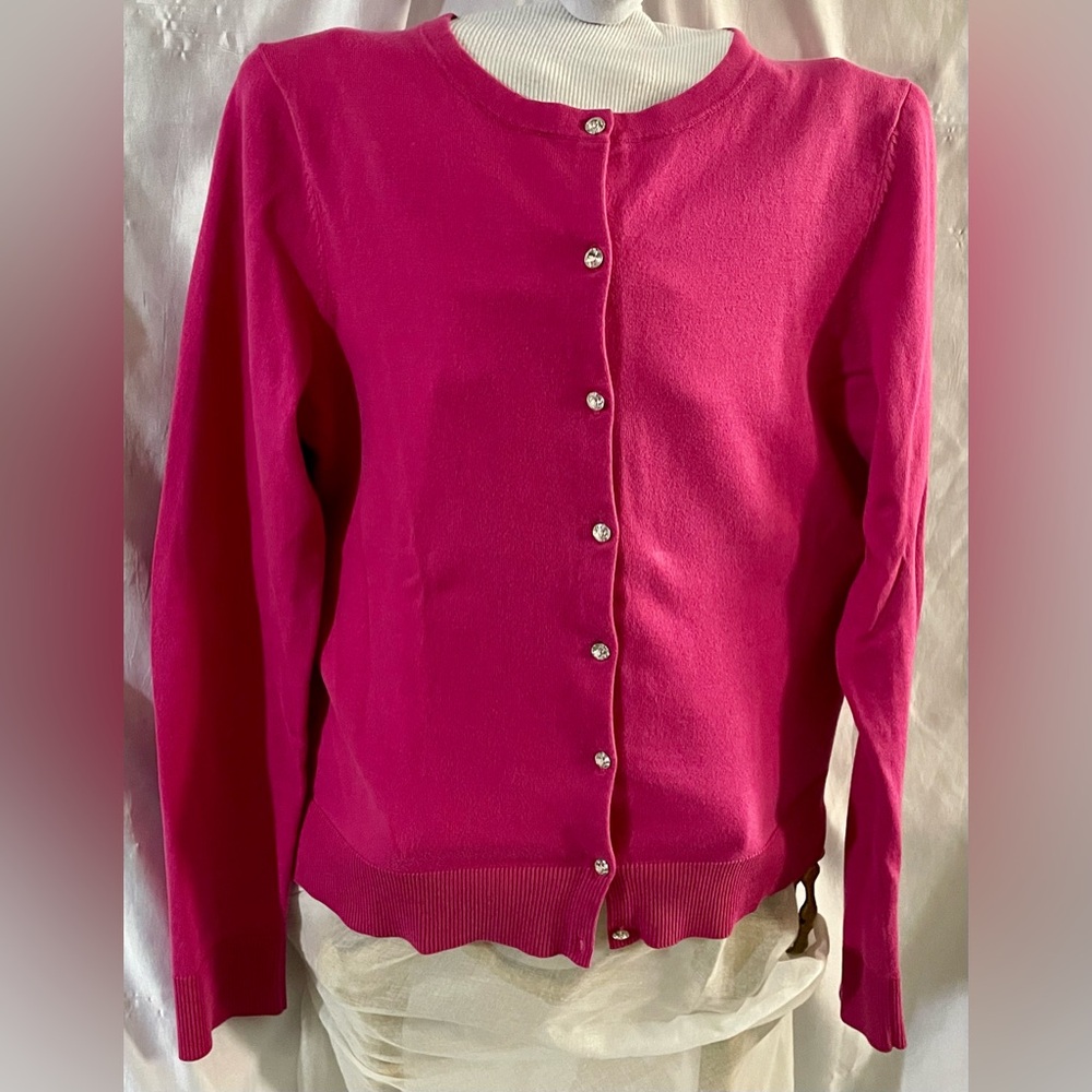 Hot Pink crop sweater with rhinestone buttons.